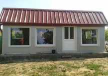 Vând case pe structură metalică învelite cu panouri sandwich