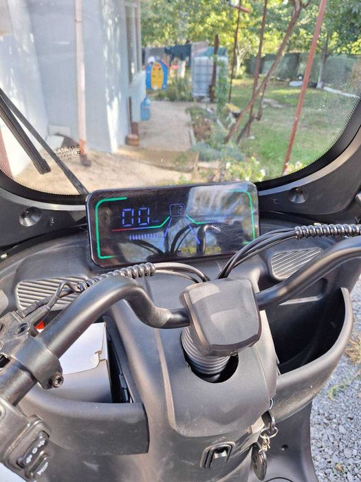 Електрическа триколка с покрив