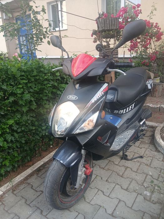 Motoscuter 49--. 2 timpi.