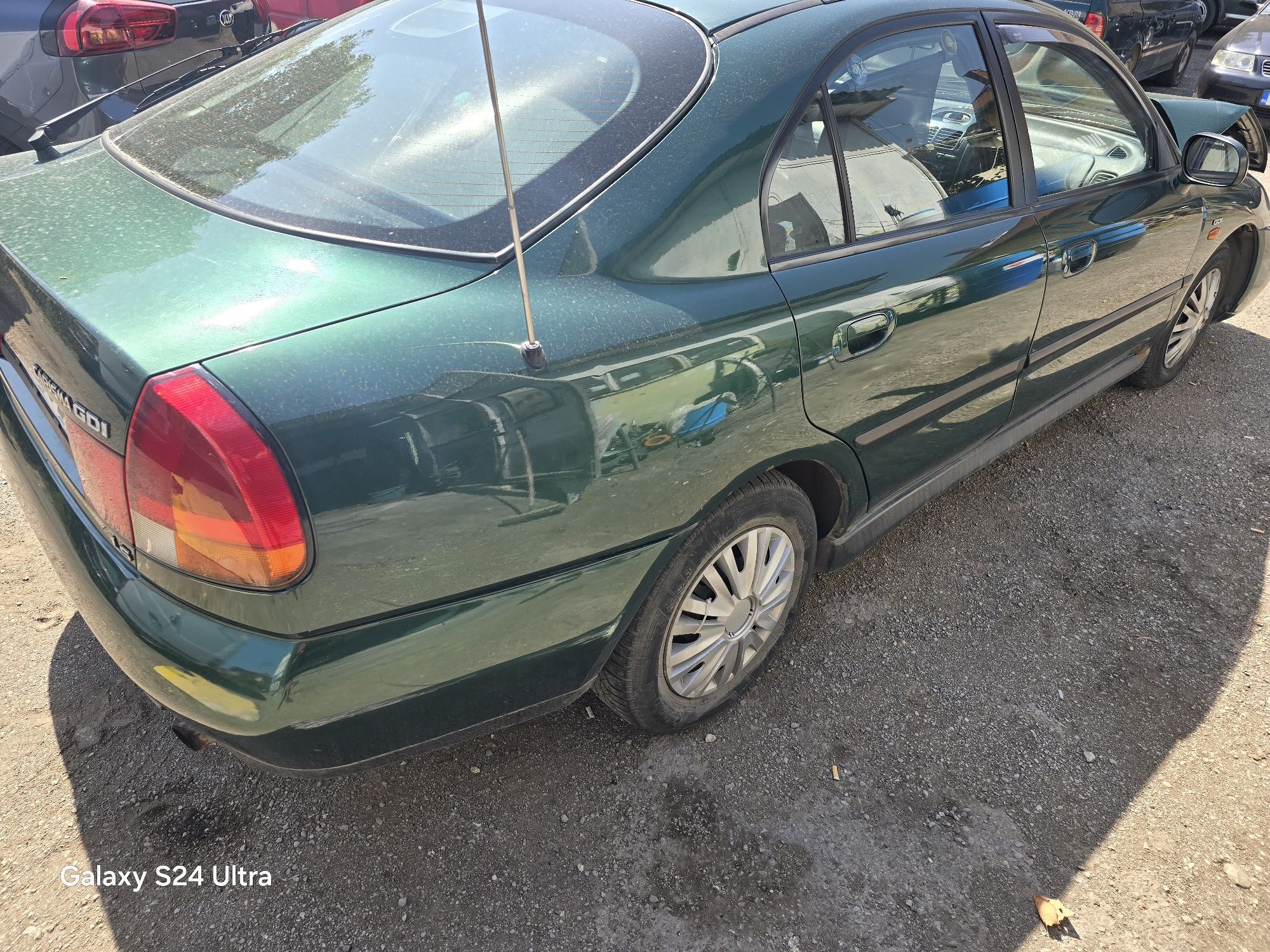 Mitsubishi Carisma GDI на части