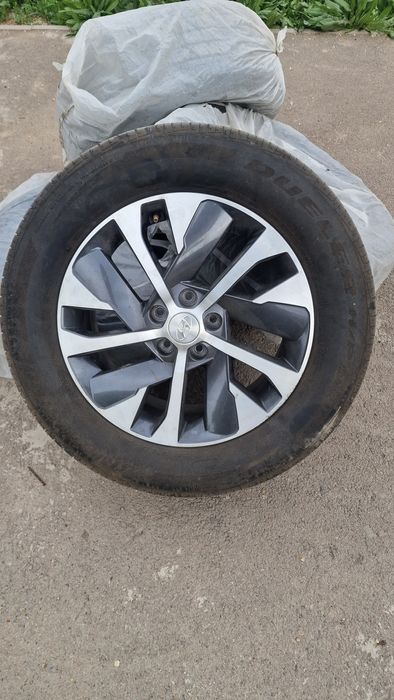 Продам летние шины Bridgstone  с дисками 18R
