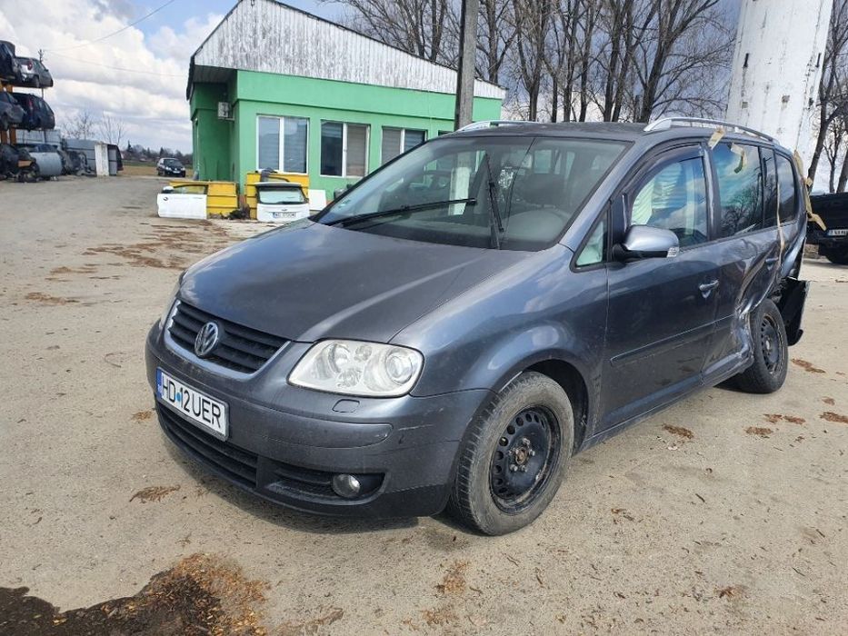 usa portiera stanga dreapta aripa fuzeta etrier planetara brat VW Touran motor 2.0tdi dezmembrez