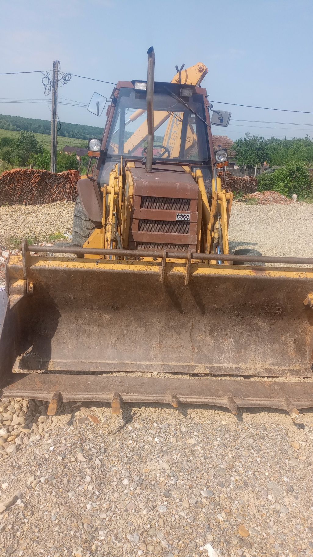 Buldoexcavator case, schimb cu auto