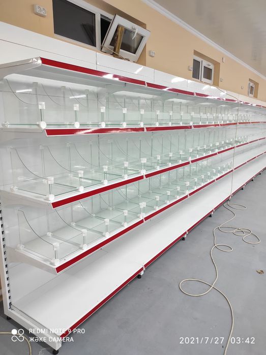 Стеллажнная полки торговые витрины для магазинов конфетная хлебная