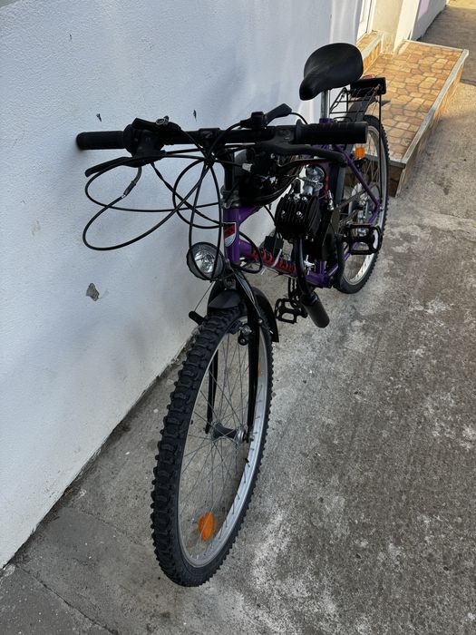 Bicicleta pe benzina ca noua