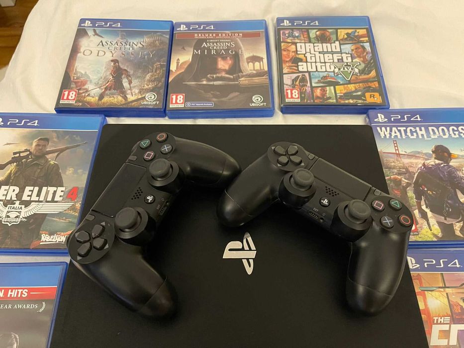 Playstation 4 PRO 1TB + 2 Controllere + 7 Jocuri + Cabluri