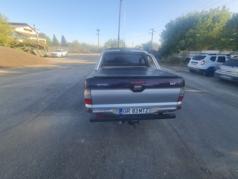 Mitsubishi L200 2005 116 hp