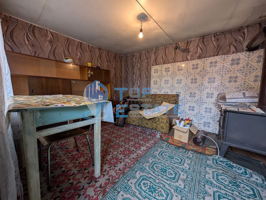 Едноетажна къща с кладенец и гараж в квартал Калтинец, град Горна Оря