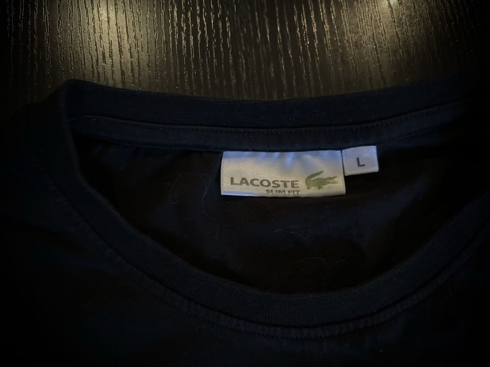 Блузи на Lacoste