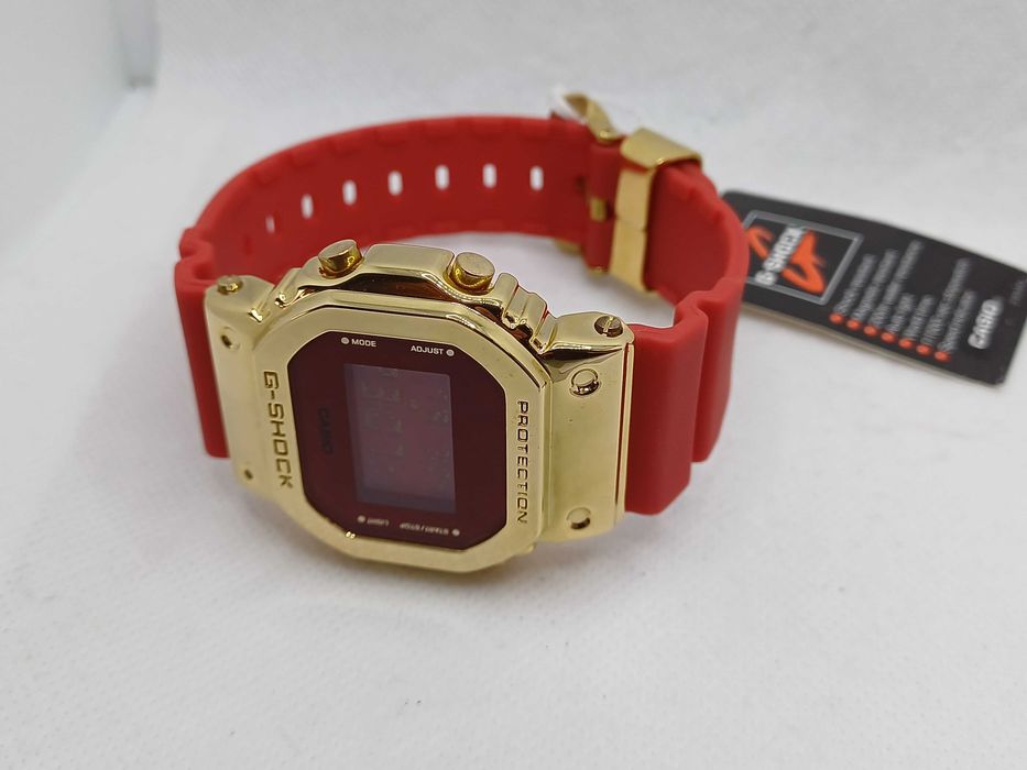 Ceas Casio g shock gm 5600cx Metal Gold-red Nou,Garantie 2 ANI