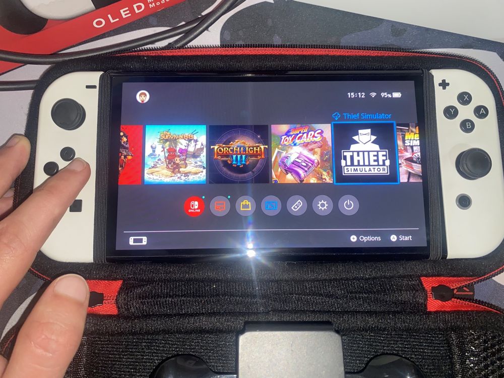 Nintendo Switch OLED white с 12 игри и твърд калъф