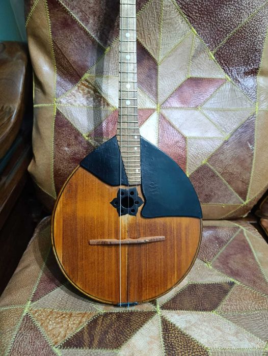 9-клёпочная домра