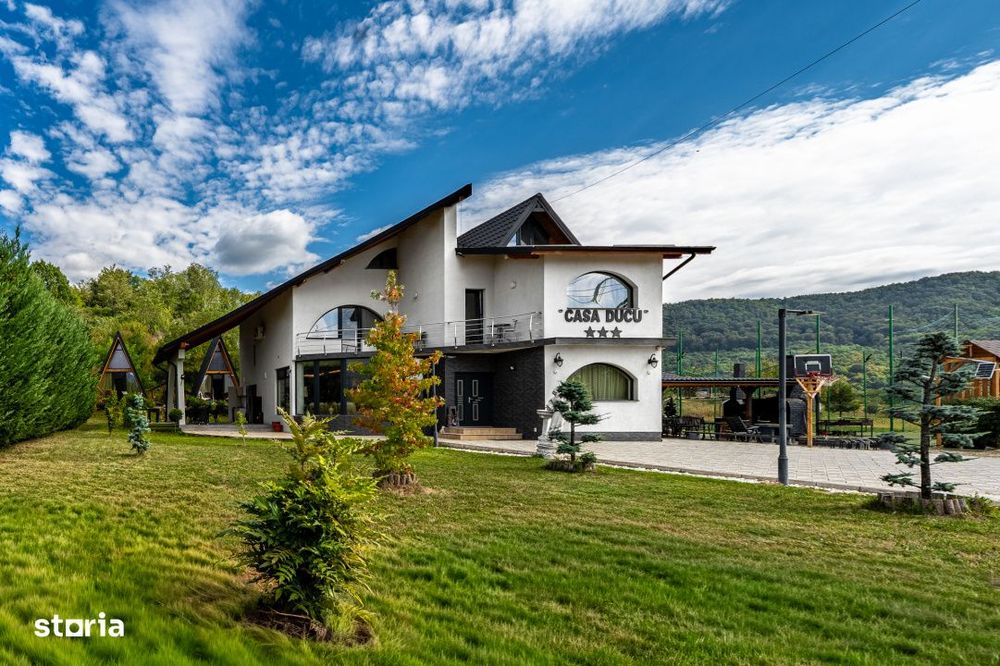 Vila turistica cu 8 camere + casute A-frame, teren 5575 mp Calimanesti