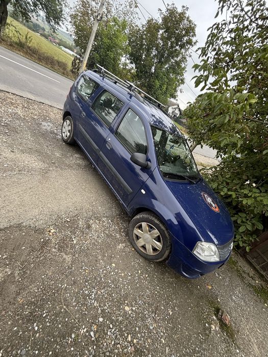 vând dacia logan