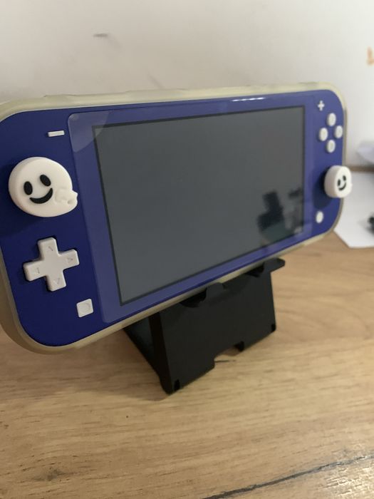 Consola portabila Nitendo switch lite + multe accesorii