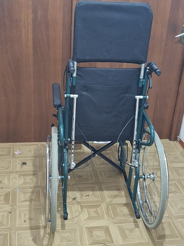 Инвалидная коляска с высокой спинкои