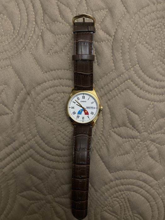 Часы Casio,на часах эмблема Казахстана и Кыргызстана