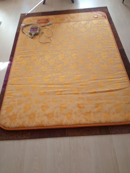 Массажный коврик с подогревом для проведения массажа