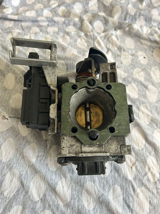 Дроссельная заслонка Volkswagen / Audi / Skoda / Seat