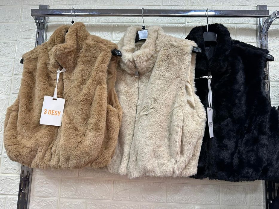 Дамски пухени елечета