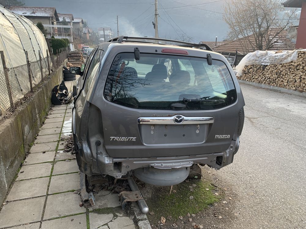 mazda tribute На части