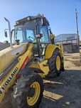 Buldoexcavator new holland
