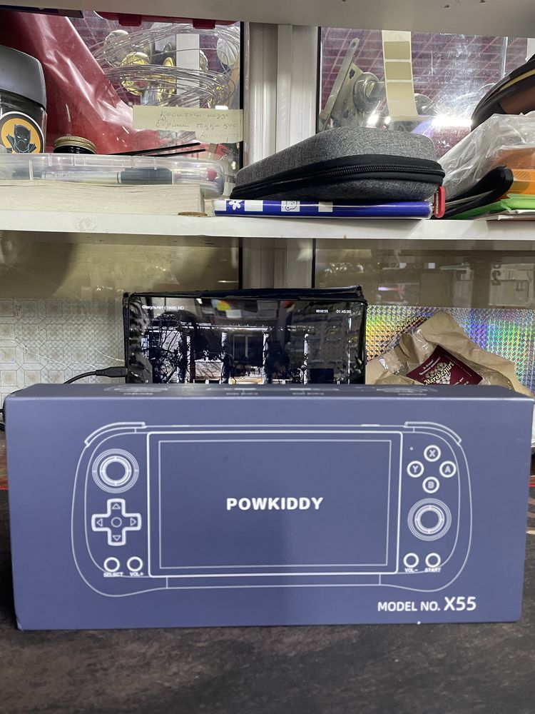 Продаю портативную ретро-приставку PAWKIDDY X55 (чёрная)