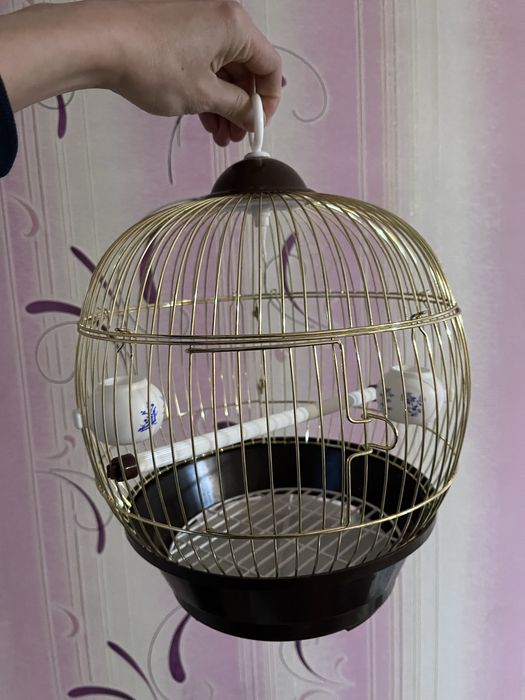 Клетка новая, высота 30 см, диам 25 см