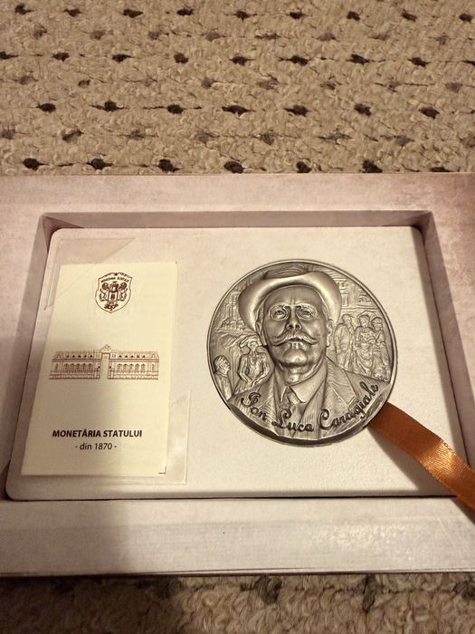 Moneda lingou Argint pur 999% Caragiale !