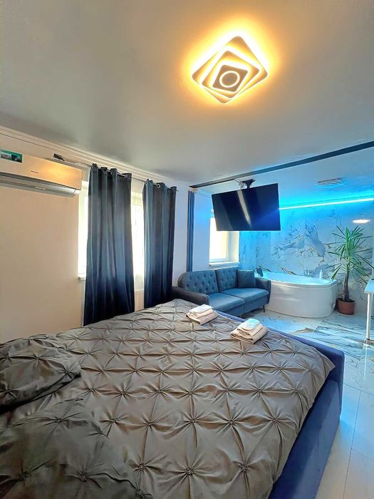 Cazare Apartament cu Jacuzzi Privat si Bucatarie