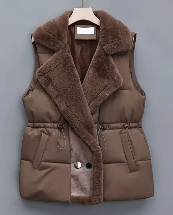 Новая женская жилетка