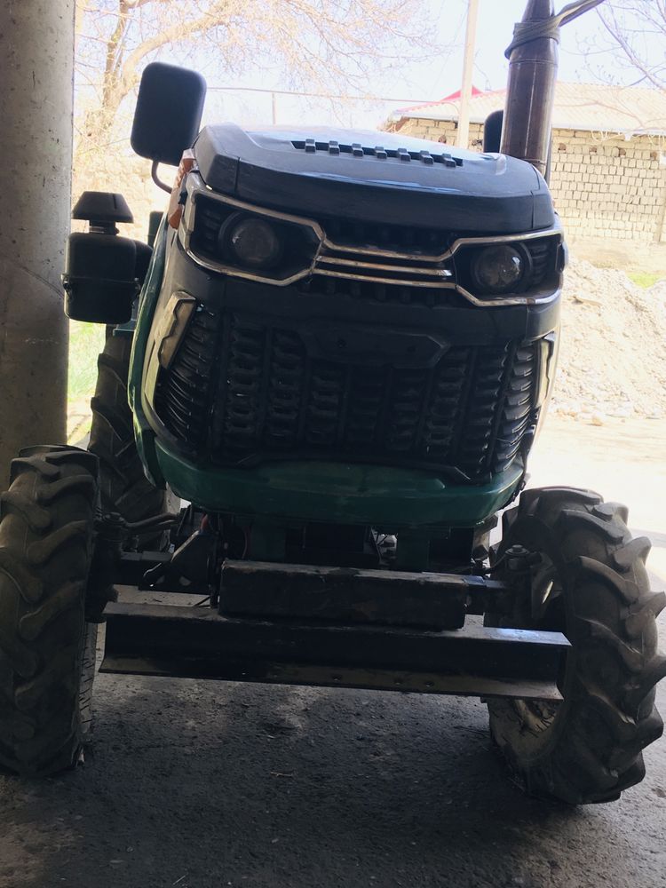 Traktor kafolatli