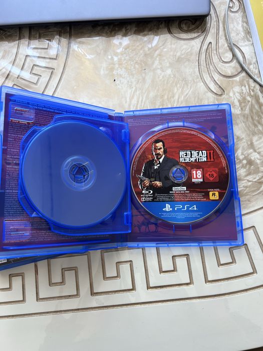 Диск RDR2 для PS4/PS5 в отличном состоянии