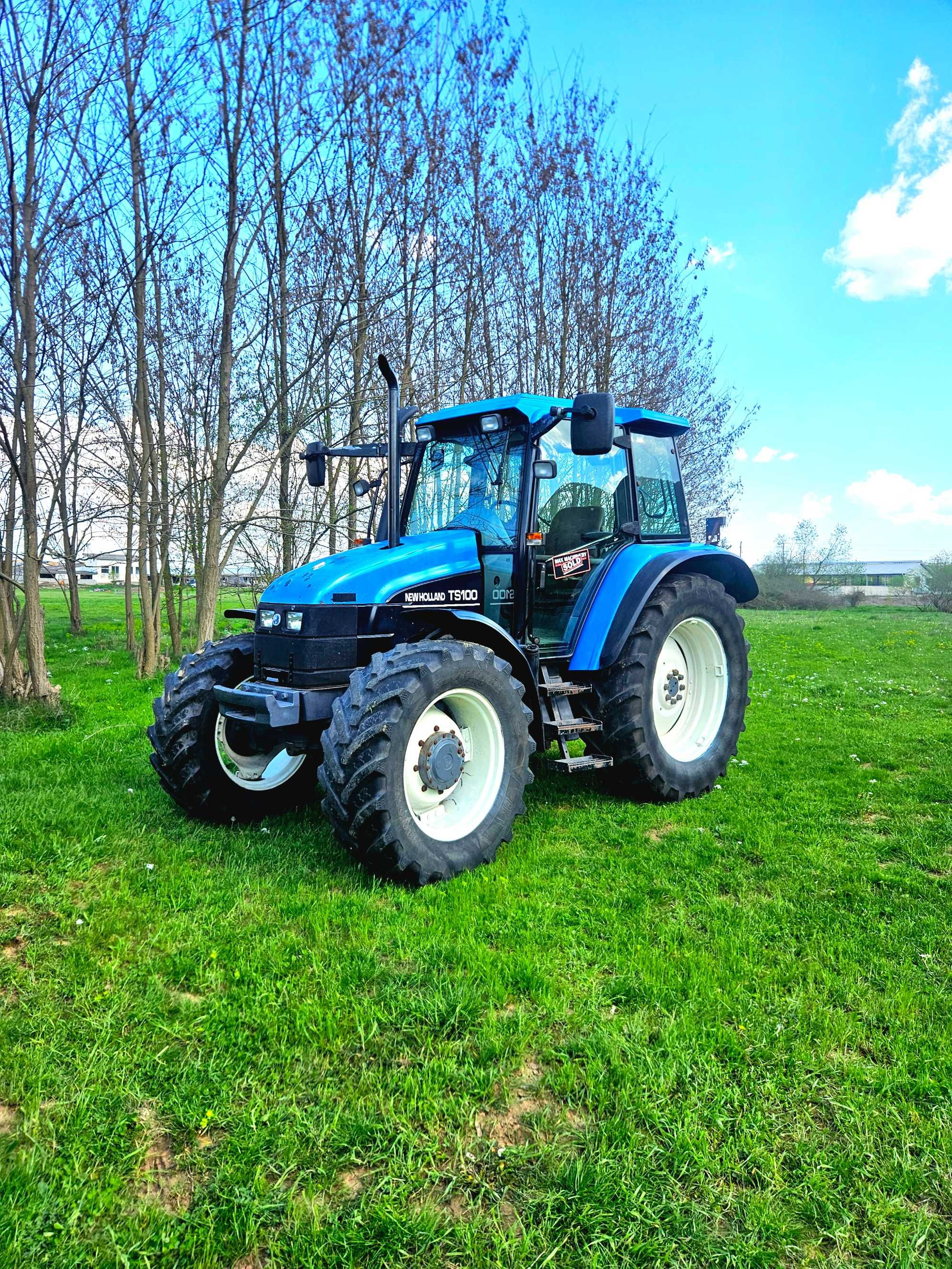 Трактор New Holland TS100