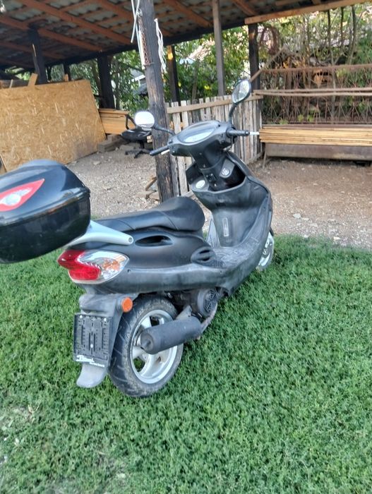 Vând scuter kymco