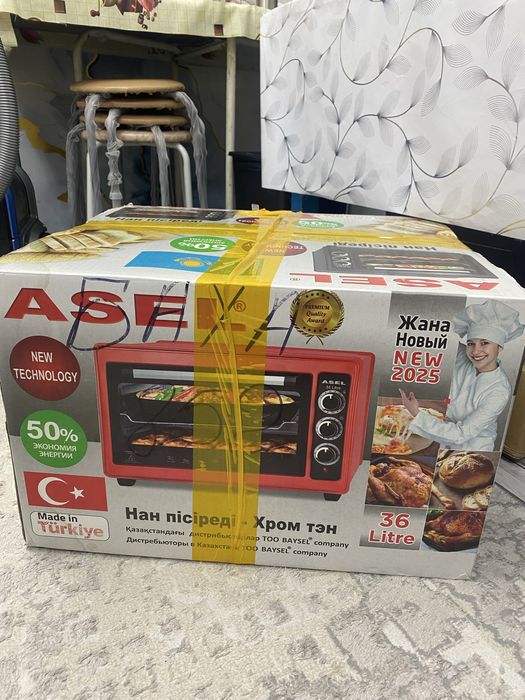 Продам духовку Асель 36 литров новая , не использованная