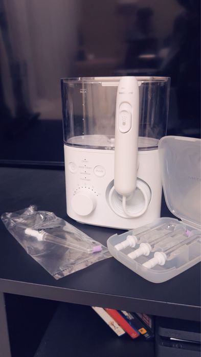 Irigator bucal Philips Sonicare Power Flosser 7000 HX3911/40 garantie