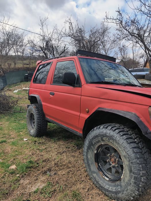 Mitsubishi Pajero Mk2 pregatit pentru offroad scurt autoutilitata