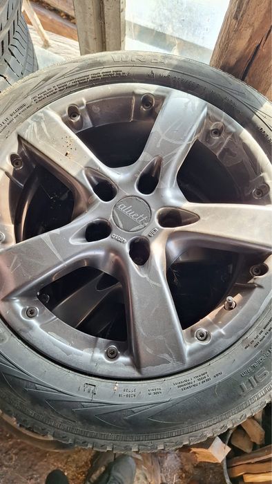 Cauciucuri 18 + un set de jante cu cauciucuri pe 16 de iarna