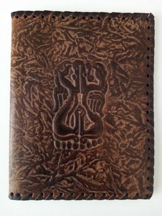 Калъф за тефтер или книга от естествена кожа.