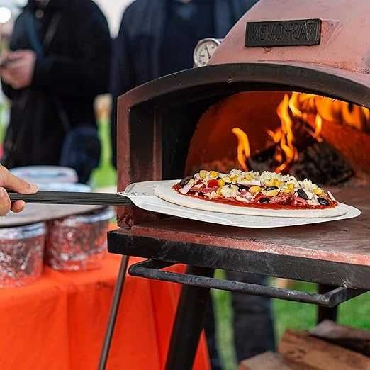 Paleta de pizza patrata perforata cu maner scurt, 305x730 mm.