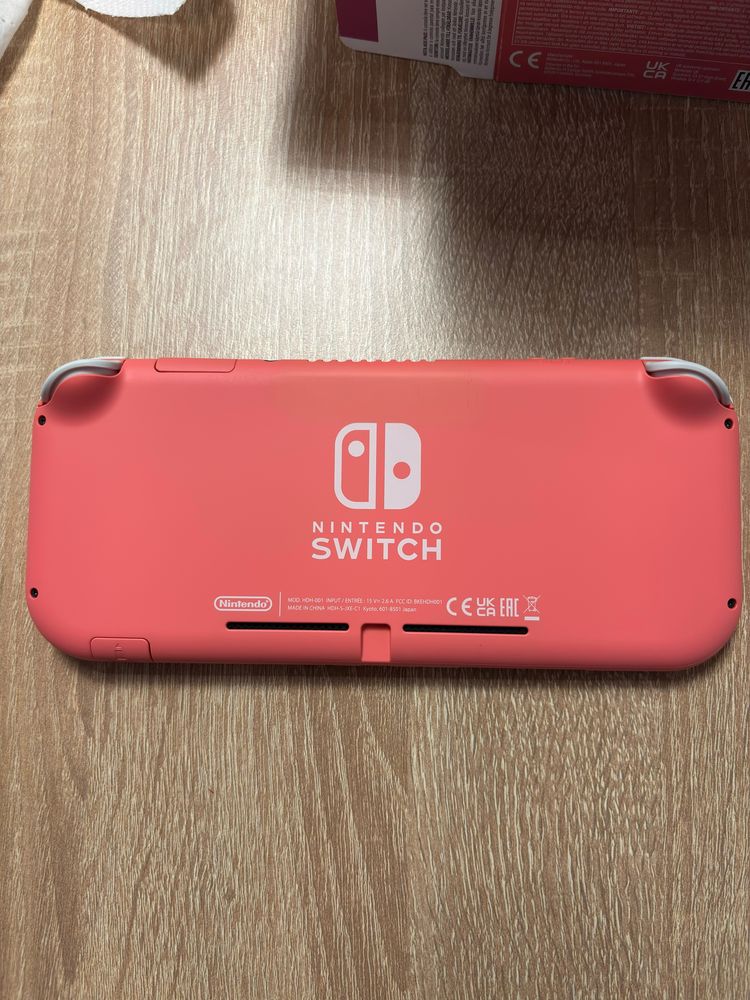 Чисто нова конзола Nintendo Switch Lite Coral