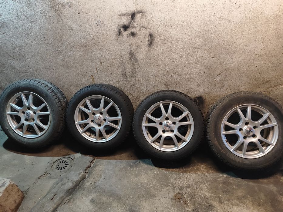 Джанти с гуми 5x114.3 15" 60.1