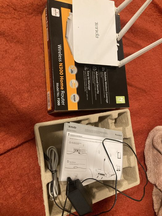 Router WiFi Tenda 300 la cutie