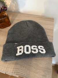 Caciula noua, Boss, Hugo Boss