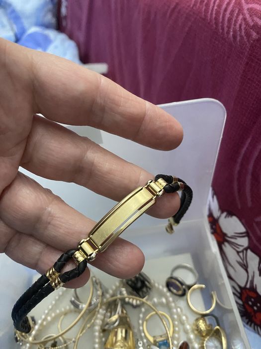 Bratara aur 14k cu piele