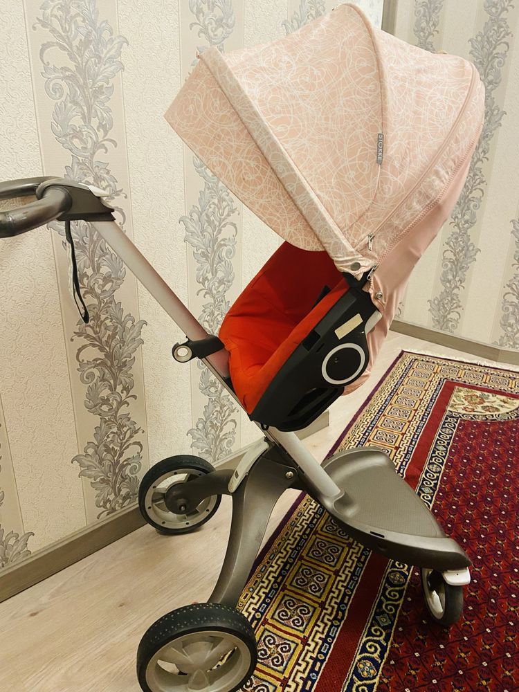 коляска Stokke прогулочная высокая