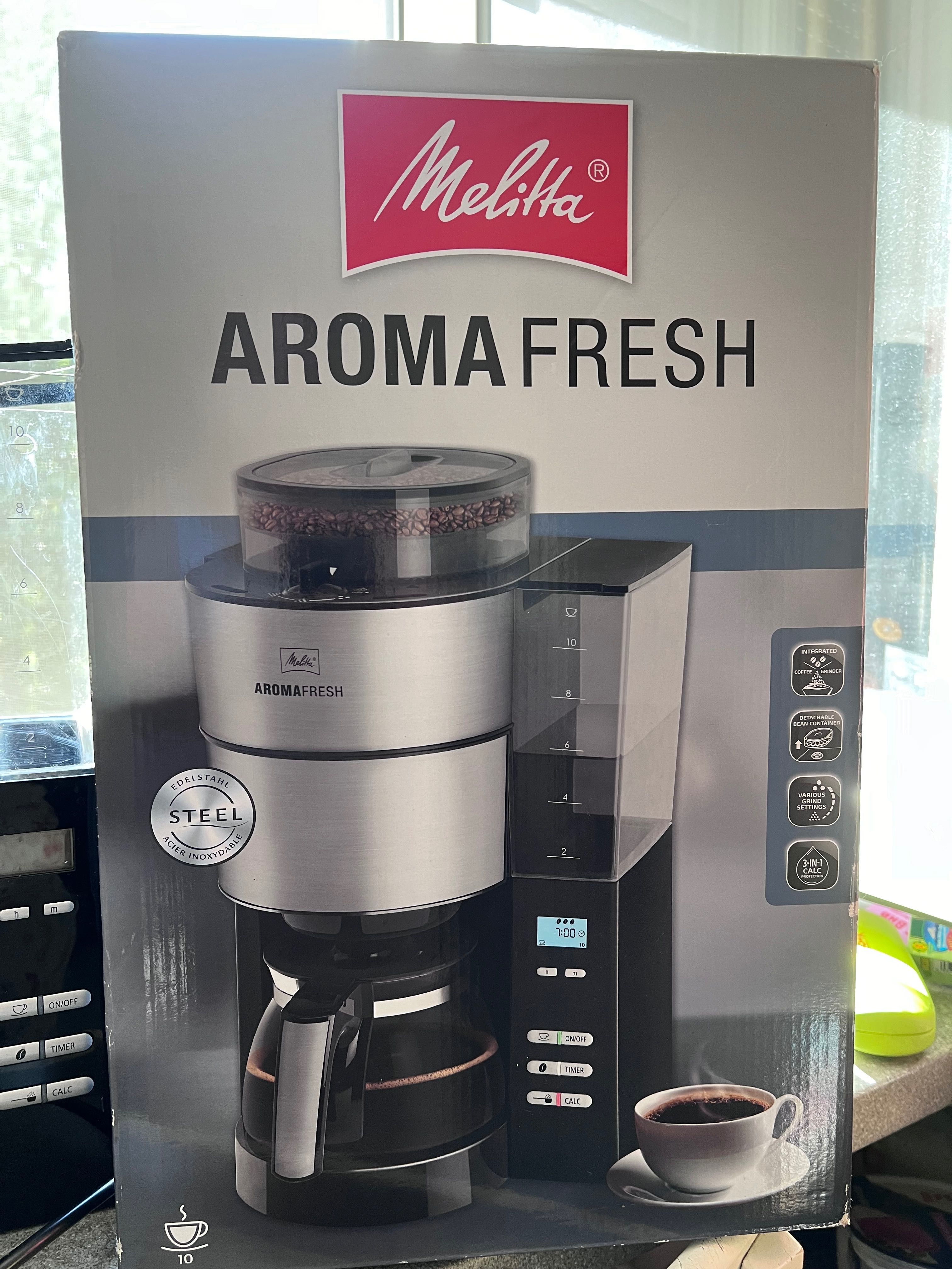 Cafetiera Melitta cu rasnita si timer