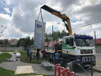 Macara + platforma .transport utilaje.containere maritime și de birou.