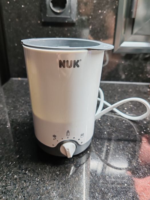 Нагревател за шише а Nuk